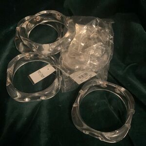 Set of five lucite bracelets by White House Black Market.  price was $14 each.